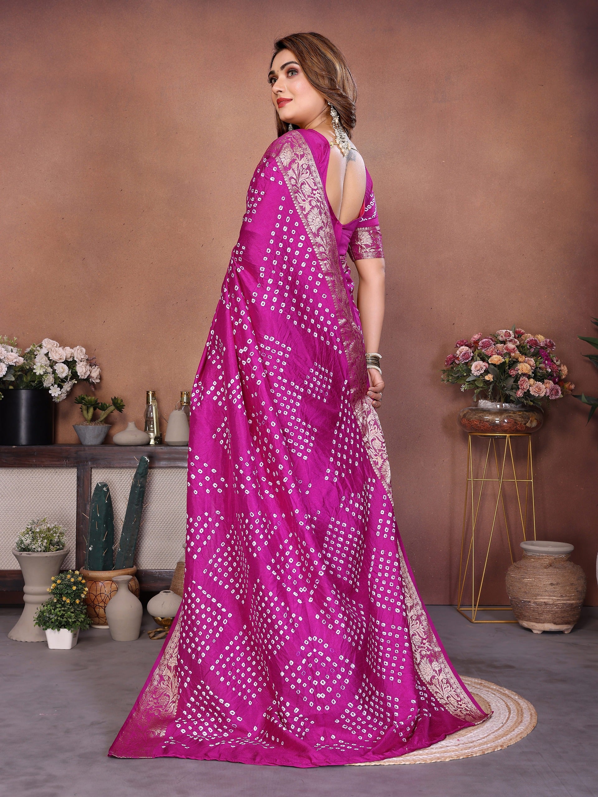 Experience Timeless Elegance With Our Pink Pure Handmade Bandhej Dola Silk Saree