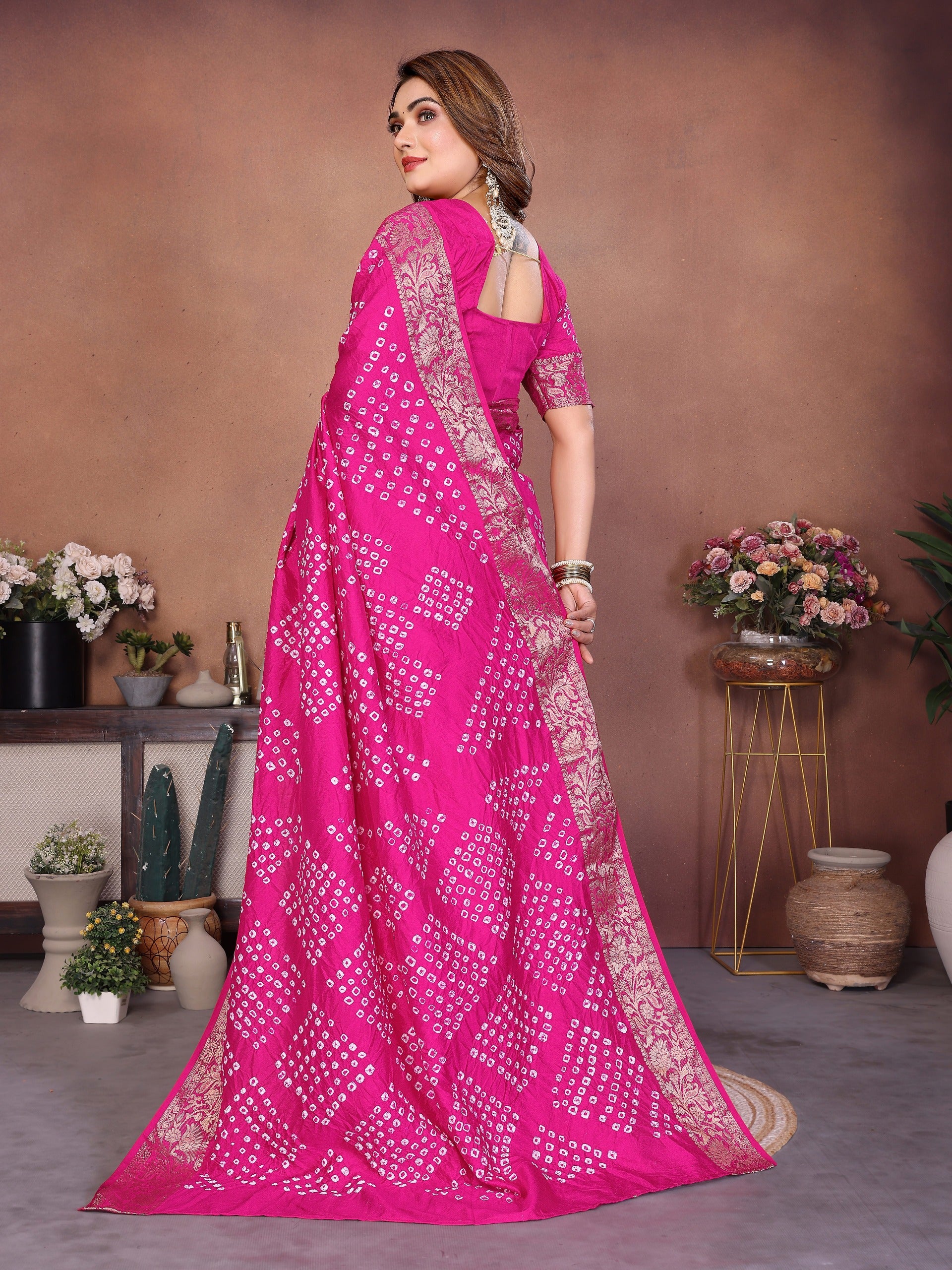 Experience Timeless Elegance With Our Pink Pure Handmade Bandhej Dola Silk Saree